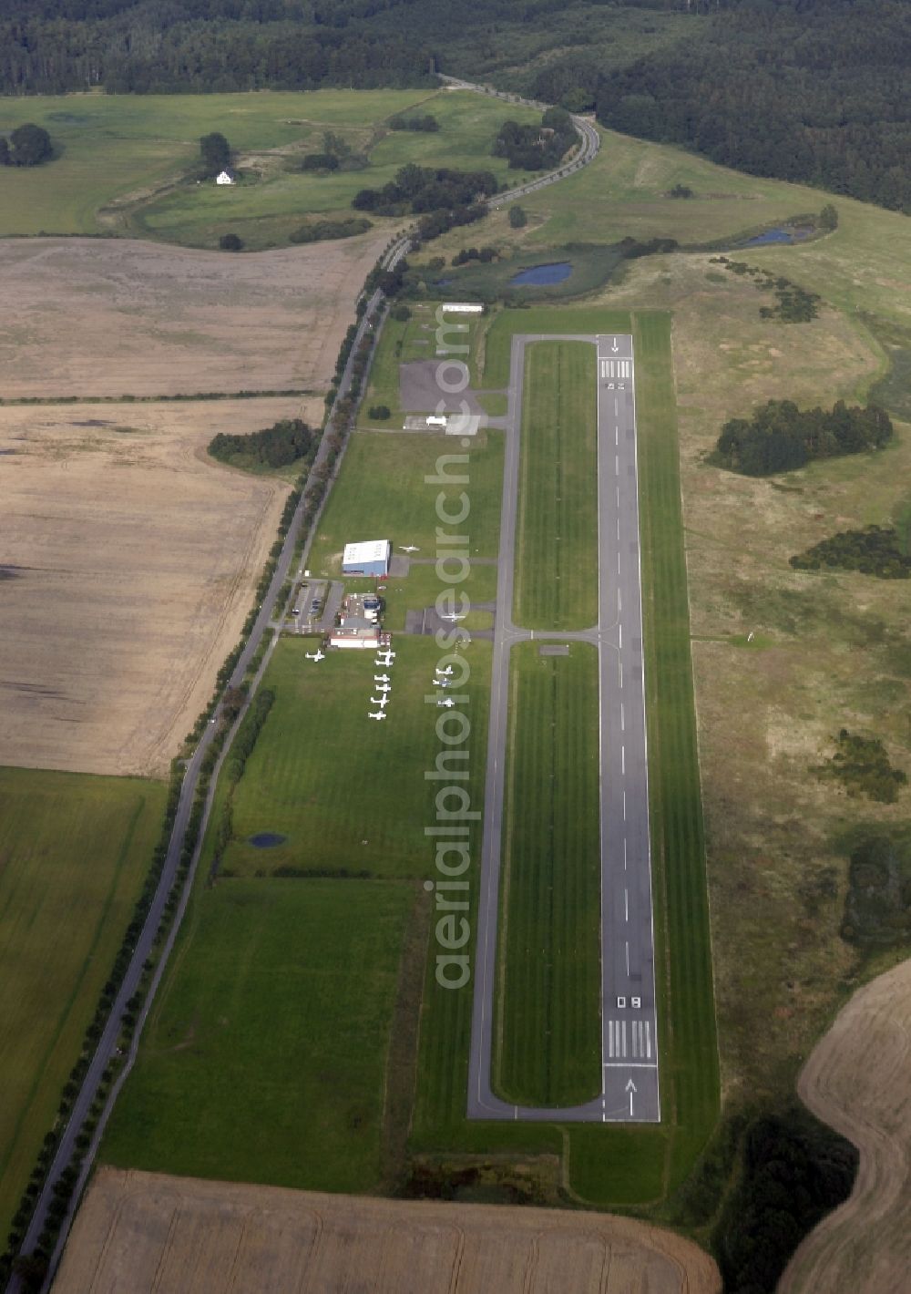 Samtens from above - Runway with hangar taxiways and terminals on the grounds of the airport Samtens-Guettin Ostseeflughafen Guettin in Samtens in the state Mecklenburg - Western Pomerania