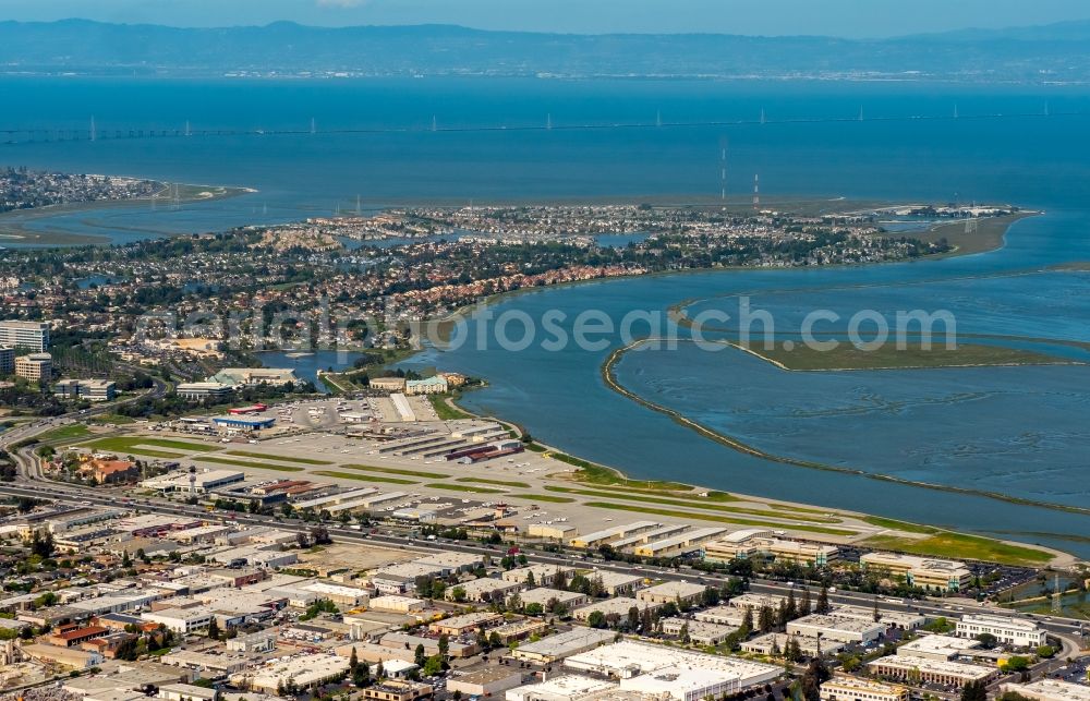 Aerial image San Carlos - Terminals on the grounds of the airport San Carlos Airport (SQL / KSQL) in front of the Redwood Shores Lagoon in San Carlos in California in the USA