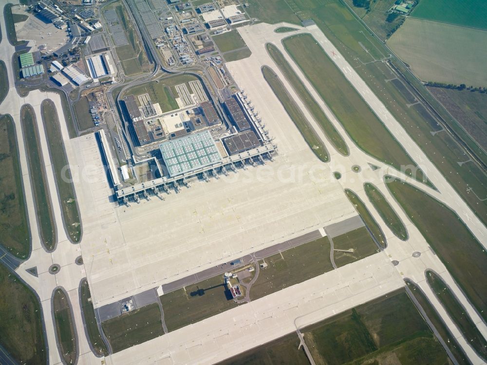 Aerial image Schönefeld - Runway with hangar taxiways and terminals on the grounds of the new airport in Schoenefeld in the state Brandenburg