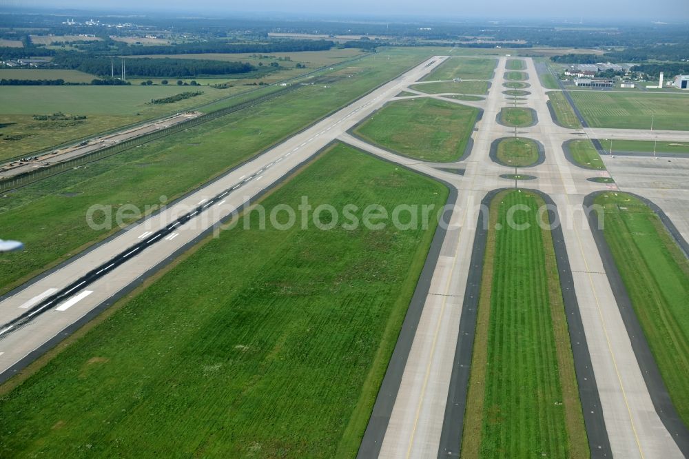 Aerial image Schönefeld - Runway with hangar taxiways and terminals on the grounds of the airport in Schoenefeld in the state Brandenburg, Germany