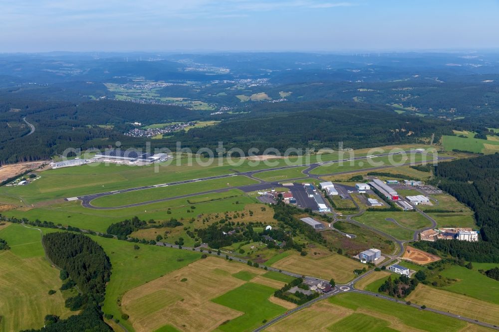 Liebenscheid from the bird's eye view: Runway with hangar taxiways and terminals on the grounds of the airport Siegerland in Liebenscheid in the state Rhineland-Palatinate