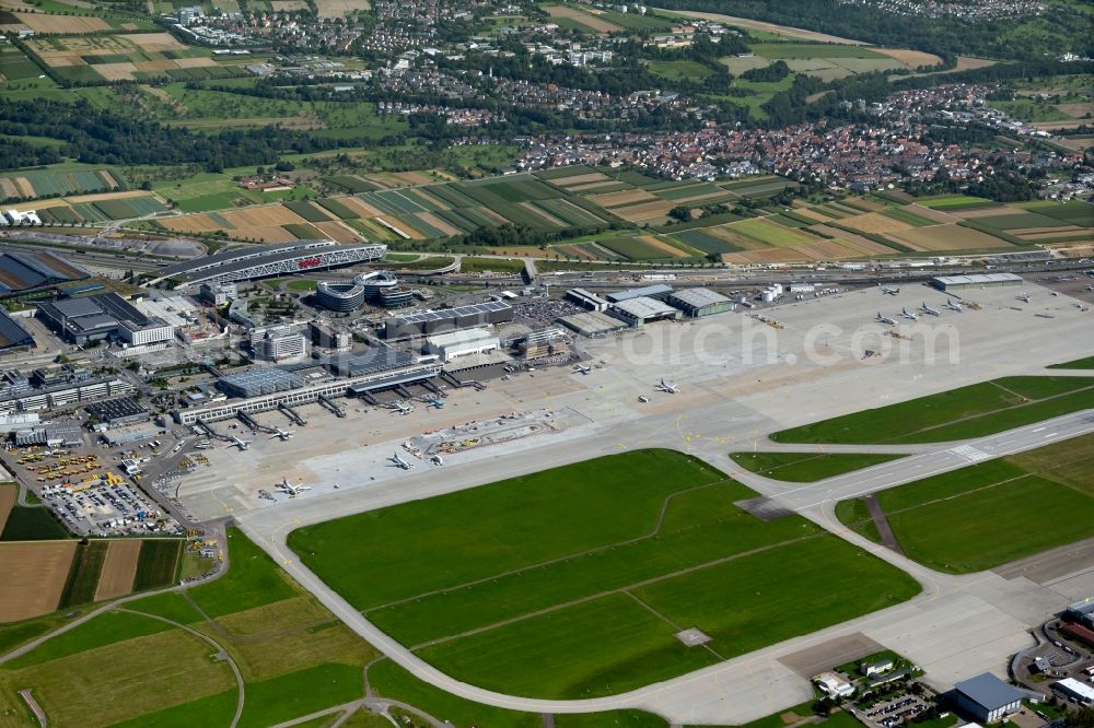 Stuttgart from above - Runway with hangar taxiways and terminals on the grounds of the airport in Stuttgart in the state Baden-Wuerttemberg, Germany