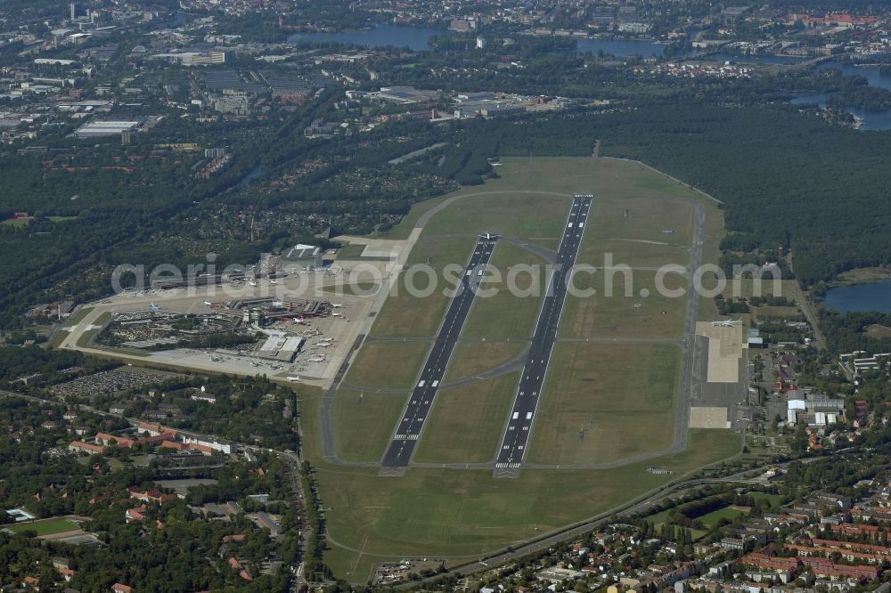 Berlin from the bird's eye view: Runway with hangar taxiways and terminals on the grounds of the Tegel airport in Berlin