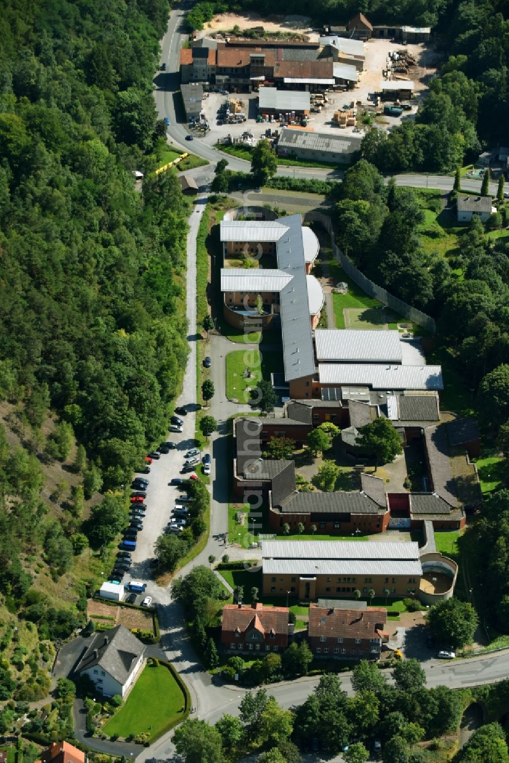 Marsberg from the bird's eye view: Security fencing on the grounds of forensics - psychiatry LWL-Therapiezentrum fuer Forensische Psychiatrie in Marsberg in the state North Rhine-Westphalia, Germany