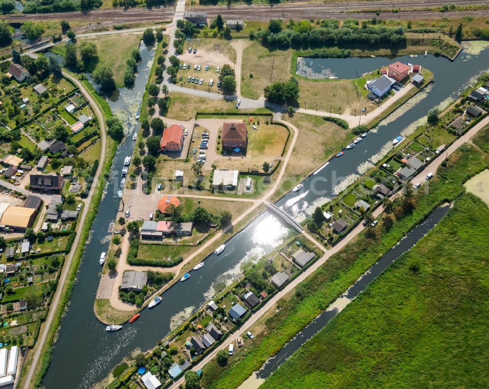 Aerial photograph Malchin - Leisure Centre - Wasserfreizeit Bremer with landing places at Am Kanal in Malchin in the state Mecklenburg - Western Pomerania