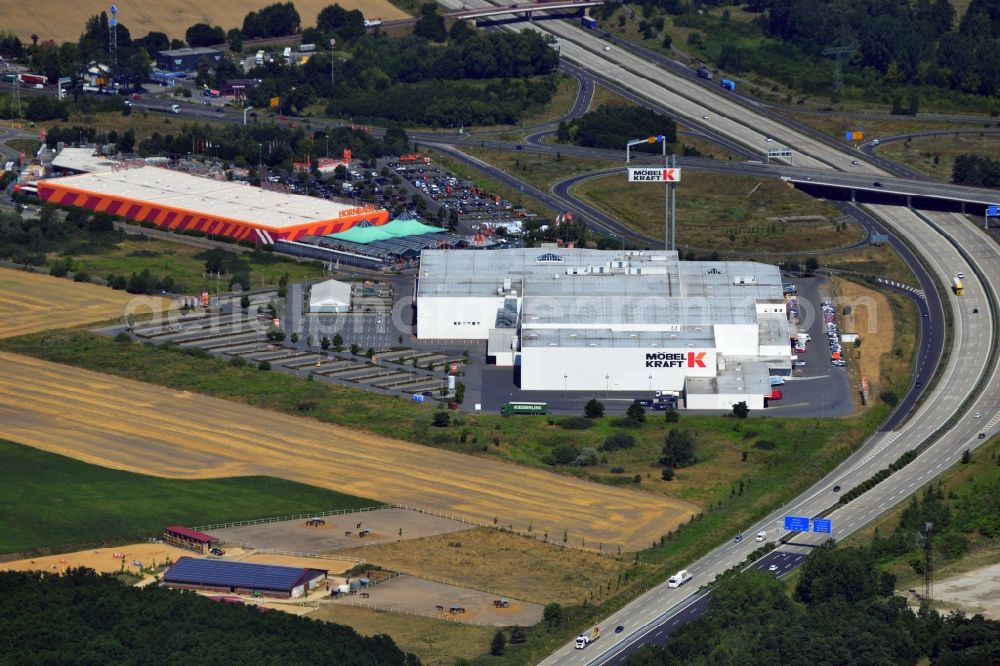 Aerial image Vogelsdorf - Premises of the business park, multi-center and shopping center at the motorway Vogelsdorf in Brandenburg