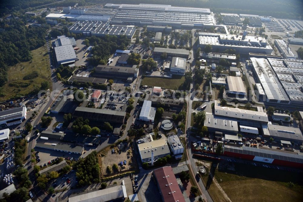 Ludwigsfelde from the bird's eye view: View at the site of the industrial park Am Birkengrund in Ludwigsfelde in the federal state of Brandenburg. Among other the company MTU, Mercedes-Benz Ludwigsfelde GmbH and Thyssen-Krupp are settled here. Operators for the industrial park east are the GESA society of development and renovation of abandoned sites mbH and for the industrial park west the IPG Infrastructure and Project Development Company