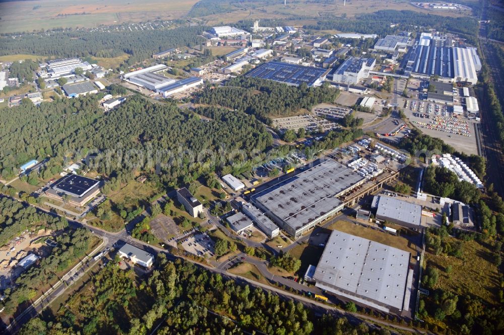 Ludwigsfelde from the bird's eye view: View at the site of the industrial park Am Birkengrund in Ludwigsfelde in the federal state of Brandenburg. Among other the company MTU, Mercedes-Benz Ludwigsfelde GmbH and Thyssen-Krupp are settled here. Operators for the industrial park east are the GESA society of development and renovation of abandoned sites mbH and for the industrial park west the IPG Infrastructure and Project Development Company