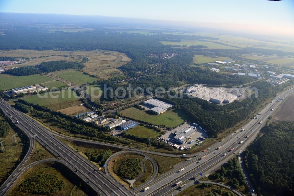 Aerial image Ludwigsfelde - View at the site of the industrial park Am Birkengrund in Ludwigsfelde in the federal state of Brandenburg. Among other the company MTU, Mercedes-Benz Ludwigsfelde GmbH and Thyssen-Krupp are settled here. Operators for the industrial park east are the GESA society of development and renovation of abandoned sites mbH and for the industrial park west the IPG Infrastructure and Project Development Company