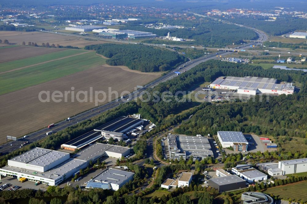 Ludwigsfelde from the bird's eye view: View at the site of the industrial park Am Birkengrund in Ludwigsfelde in the federal state of Brandenburg. Among other the company MTU, Mercedes-Benz Ludwigsfelde GmbH and Thyssen-Krupp are settled here. Operators for the industrial park east are the GESA society of development and renovation of abandoned sites mbH and for the industrial park west the IPG Infrastructure and Project Development Company