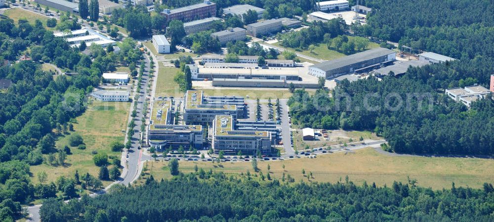 Aerial photograph Berlin - Blick auf das Gelände des Innovationspark Wuhlheide auf dem ehemaligen Gelände des Ministeriums für Wissenschaft und Technik der DDR. Seit seiner Gründung im Jahr 1990 als erstes Technologie- und Gründerzentrum der neuen Bundesländer hat sich der IWP in Berlin zu einem wichtigen Gewerbe-Campus des Bezirks Treptow-Köpenick entwickelt.Betreiber ist die IMG mbH Innovationspark Wuhlheide Managementgesellschaft. The site of innovation Wuhlheide on the former site of the Ministry of Science and Technology of the GDR.