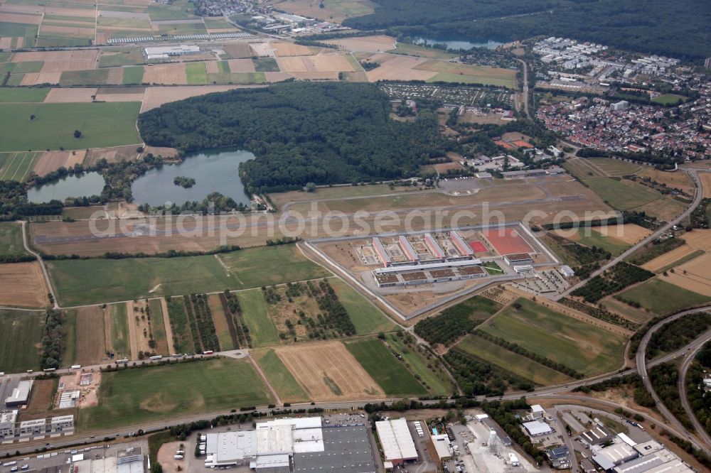 Offenburg from the bird's eye view: Prison grounds and high security fence Prison in Offenburg in the state Baden-Wuerttemberg. Behind the prison is situated the aerodrome Offenburg-Baden, ICAO Code EDTO, a special airfield