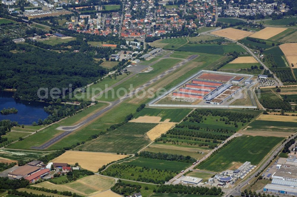 Aerial image Offenburg - Prison grounds and high security fence Prison in Offenburg in the state Baden-Wuerttemberg. Behind the prison is situated the aerodrome Offenburg-Baden, ICAO Code EDTO, a special airfield