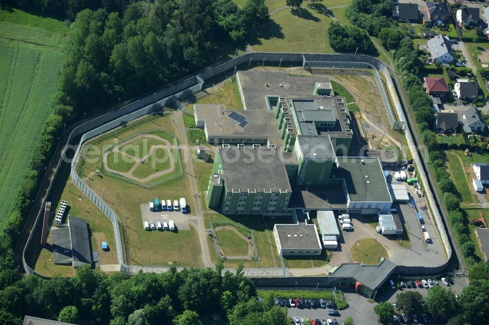 Fröndenberg/Ruhr from the bird's eye view: Prison premises and secure fencing of the JVA - correctional hospital - prison hospital in Froendenberg/Ruhr in the state North Rhine-Westphalia