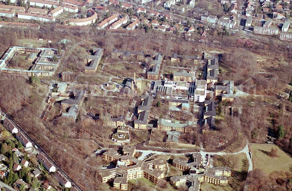 Berlin - Reinickendorf from the bird's eye view: Gelände der Karl-Bonhoeffer-Nervenklinik am gleichnamigen S-und U-Bahnhof an der Oranienburger Straße / Eichborndamm in Berlin Reinickendorf, nordöstlich des Flughafens Berlin-Tegel.