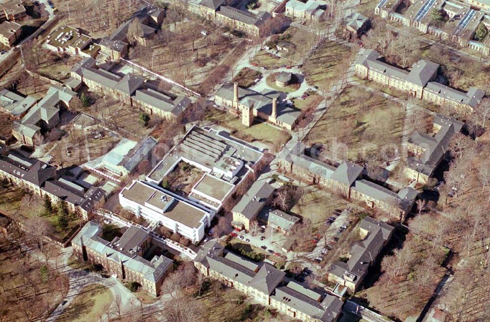 Berlin - Reinickendorf from the bird's eye view: Gelände der Karl-Bonhoeffer-Nervenklinik am gleichnamigen S-und U-Bahnhof an der Oranienburger Straße / Eichborndamm in Berlin Reinickendorf, nordöstlich des Flughafens Berlin-Tegel.