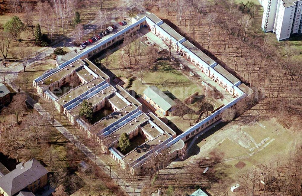 Aerial image Berlin - Reinickendorf - Gelände der Karl-Bonhoeffer-Nervenklinik am gleichnamigen S-und U-Bahnhof an der Oranienburger Straße / Eichborndamm in Berlin Reinickendorf, nordöstlich des Flughafens Berlin-Tegel.