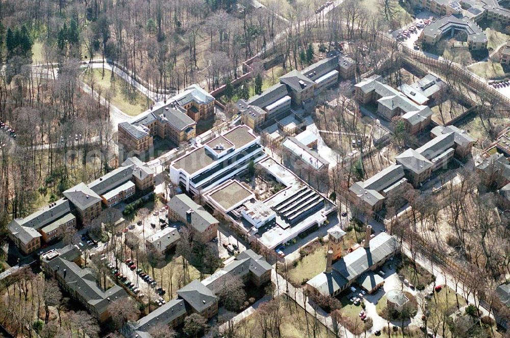 Berlin-Reinickendorf from the bird's eye view: Gelände der Karl-Bonhoeffer-Nervenklinik am gleichnamigen S-und U-Bahnhof an der Oranienburger Straße / Eichborndamm in Berlin Reinickendorf, nordöstlich des Flughafens Berlin-Tegel.