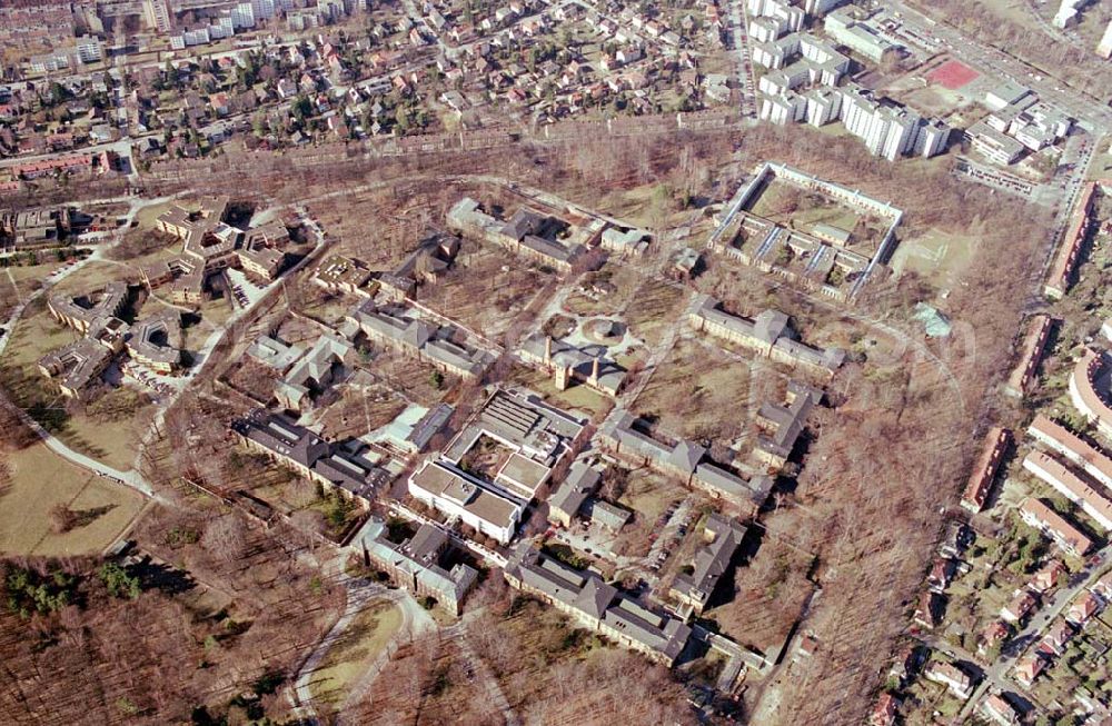 Berlin - Reinickendorf from the bird's eye view: Gelände der Karl-Bonhoeffer-Nervenklinik am gleichnamigen S-und U-Bahnhof an der Oranienburger Straße / Eichborndamm in Berlin Reinickendorf, nordöstlich des Flughafens Berlin-Tegel.