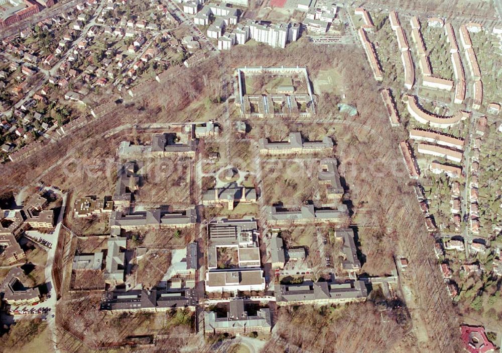 Berlin - Reinickendorf from the bird's eye view: Gelände der Karl-Bonhoeffer-Nervenklinik am gleichnamigen S-und U-Bahnhof an der Oranienburger Straße / Eichborndamm in Berlin Reinickendorf, nordöstlich des Flughafens Berlin-Tegel.