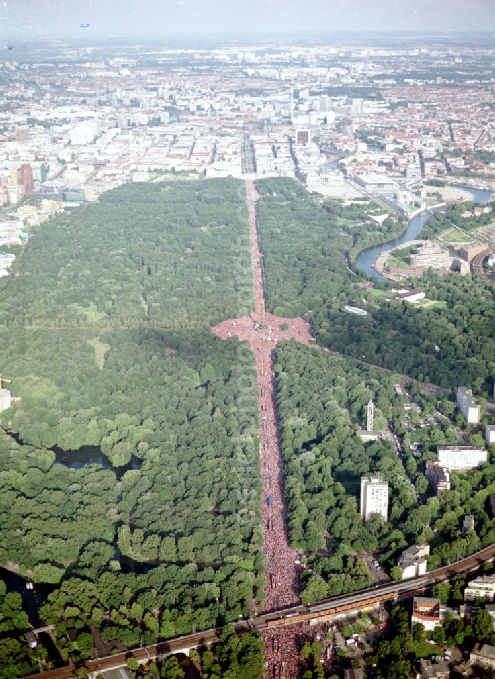 Aerial image Berlin - Participant of the Loveparade music festival on the event concert area at the Grosser Stern - Victory Column - Sttrasse on June 17th in the district of Tiergarten in Berlin, Germany