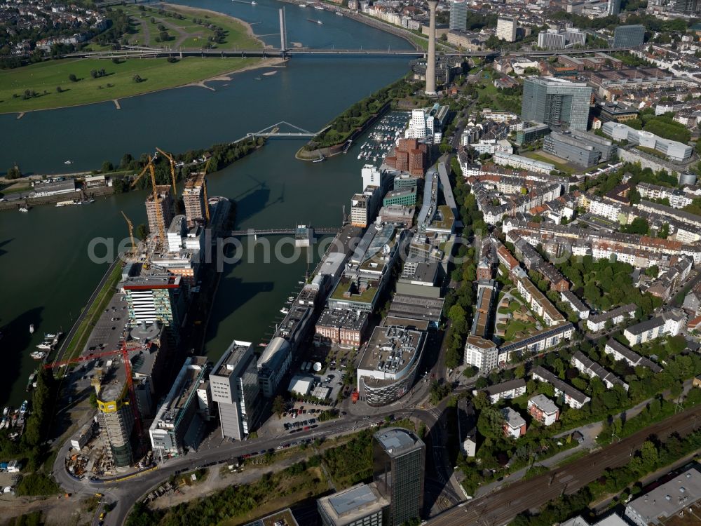 Aerial image Düsseldorf - Site of the Düsseldorf media harbor on the banks of the Rhine in North Rhine-Westphalia