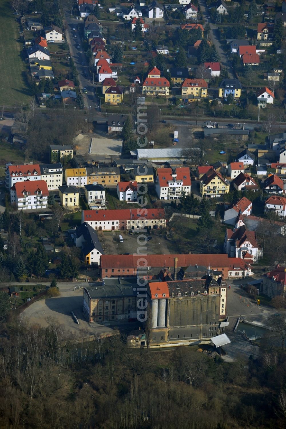 Aerial image Stahmeln - On the historic grounds of the mill Stahmeln near Leipzig in Saxony flour is still produced today. It is driven by the water mill of the White Elster, which also moves the turbines of a small hydroelectric power plant. The building complex includes the mill building with flour transport and staircase tower, the grain elevator, the former stables, the administration building, the following house and the former villa of the mill owner