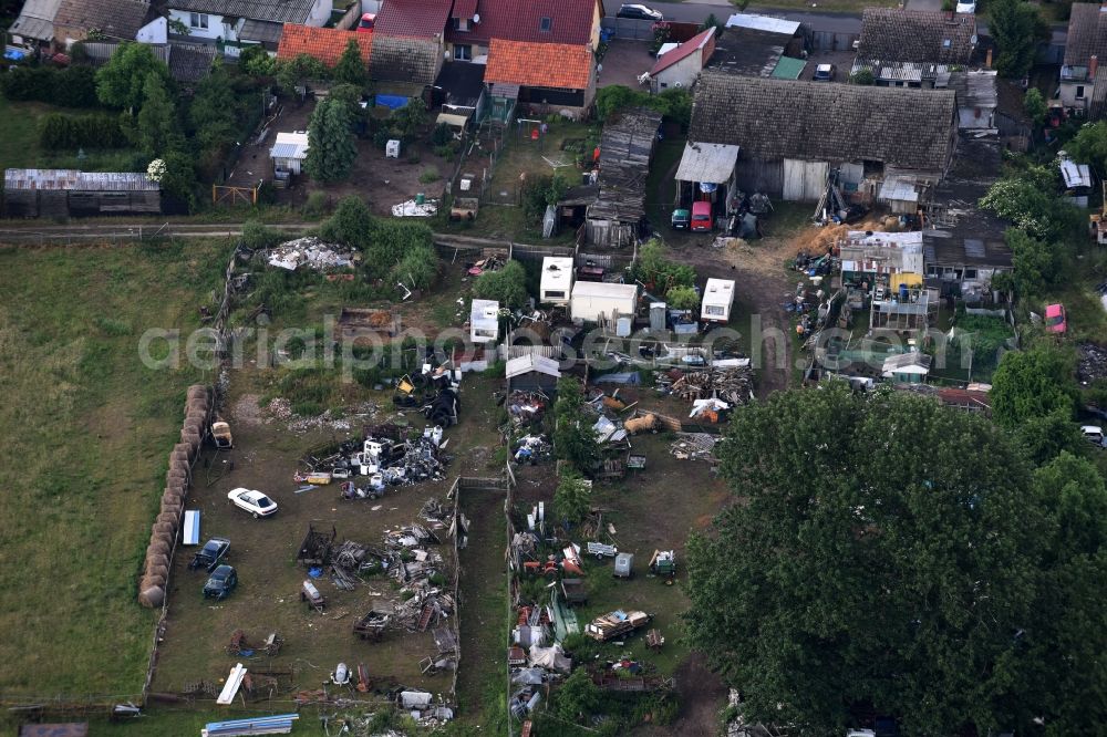 Aerial image Kremmen - Site of the landfill and scrap yard to Autowrack- disposal and disassembly for replacement commercial on Poststrasse in Kremmen in the state Brandenburg