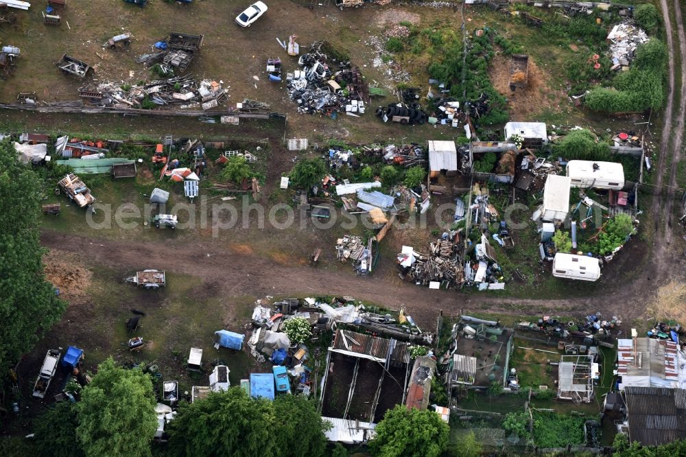 Kremmen from above - Site of the landfill and scrap yard to Autowrack- disposal and disassembly for replacement commercial on Poststrasse in Kremmen in the state Brandenburg