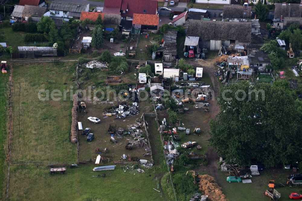 Kremmen from above - Site of the landfill and scrap yard to Autowrack- disposal and disassembly for replacement commercial on Poststrasse in Kremmen in the state Brandenburg