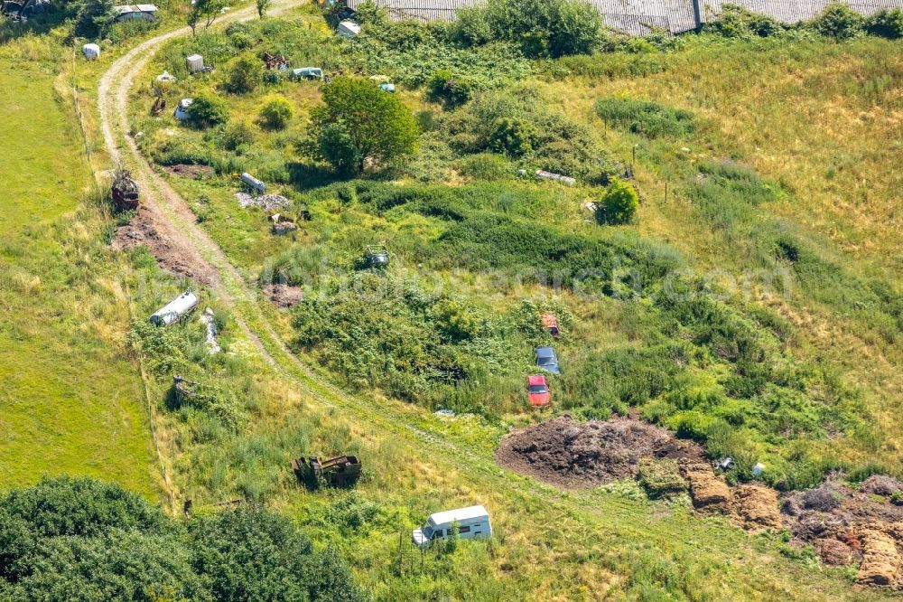 Wetter (Ruhr) from the bird's eye view: Site of the landfill and scrap yard to Autowrack- disposal and disassembly in the district Esborn in Wetter (Ruhr) in the state North Rhine-Westphalia, Germany