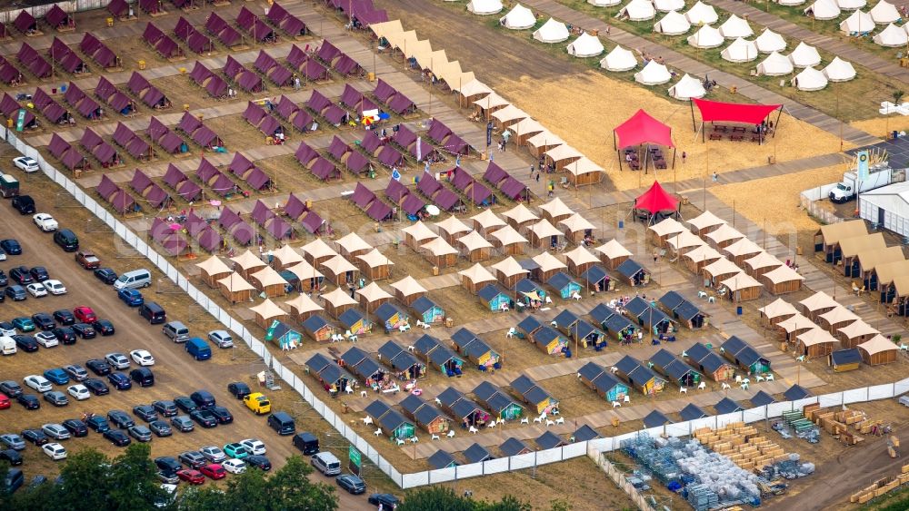 Aerial image Weeze - Participants in the PAROOKAVILLE - Electronic Music Festival music festival on the event concert area in Weeze in the state North Rhine-Westphalia, Germany