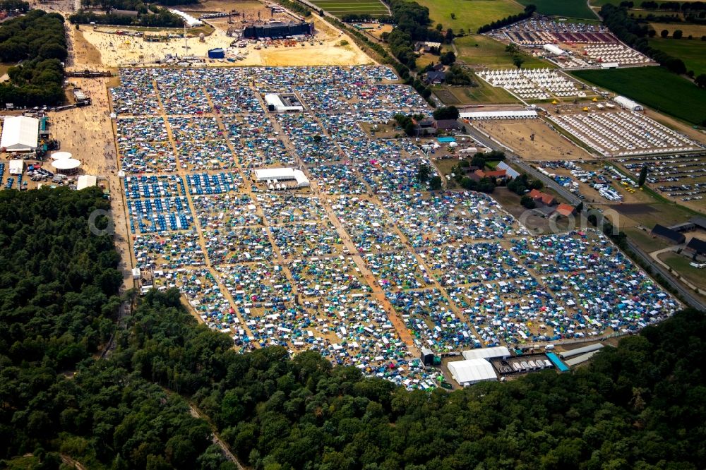 Weeze from above - Participants in the PAROOKAVILLE - Electronic Music Festival music festival on the event concert area in Weeze in the state North Rhine-Westphalia, Germany