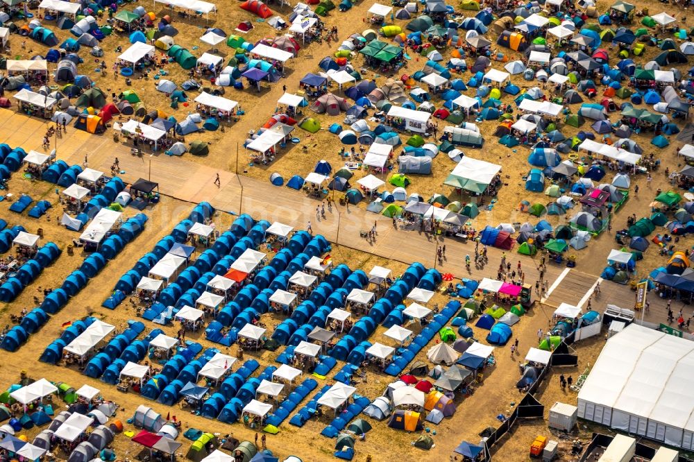 Aerial image Weeze - Participants in the PAROOKAVILLE - Electronic Music Festival music festival on the event concert area in Weeze in the state North Rhine-Westphalia, Germany