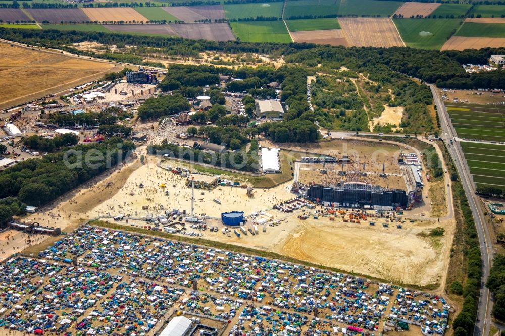 Weeze from above - Participants in the PAROOKAVILLE - Electronic Music Festival music festival on the event concert area in Weeze in the state North Rhine-Westphalia, Germany