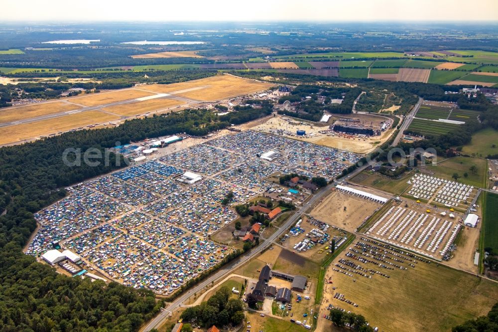 Aerial image Weeze - Participants in the PAROOKAVILLE - Electronic Music Festival music festival on the event concert area in Weeze in the state North Rhine-Westphalia, Germany