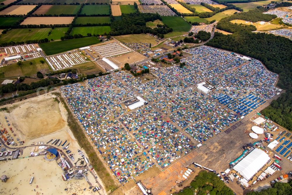 Weeze from above - Participants in the PAROOKAVILLE - Electronic Music Festival music festival on the event concert area in Weeze in the state North Rhine-Westphalia, Germany