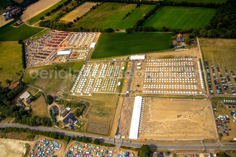 Weeze from above - Participants in the PAROOKAVILLE - Electronic Music Festival music festival on the event concert area in Weeze in the state North Rhine-Westphalia, Germany