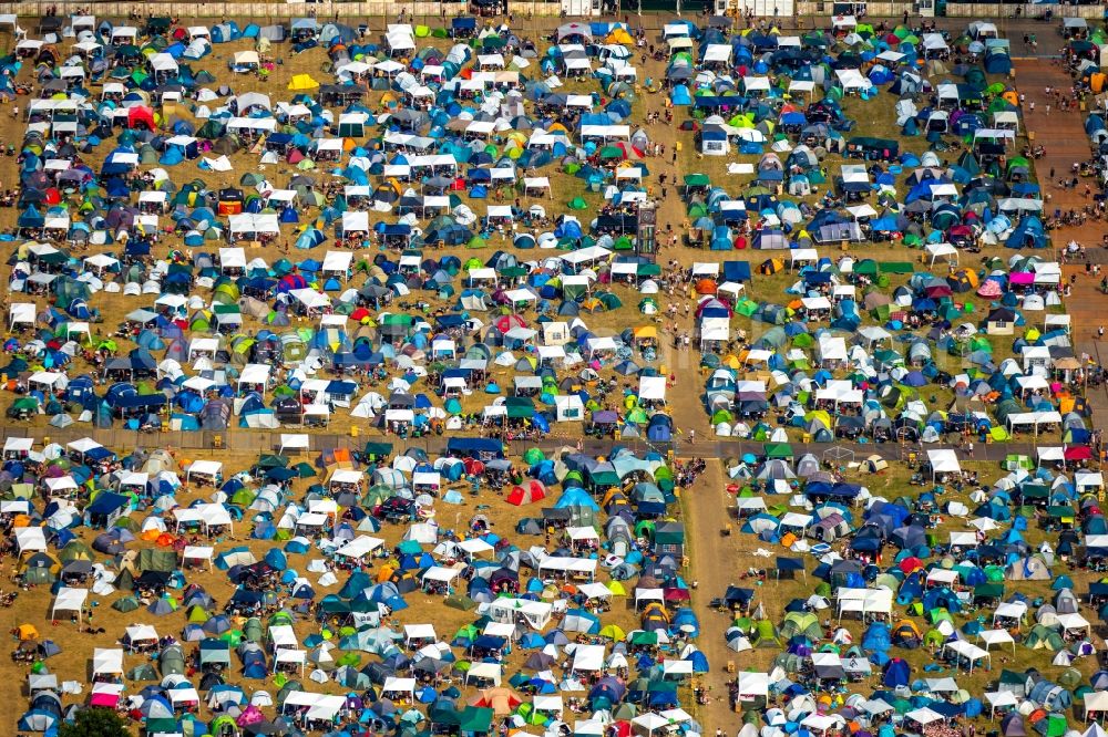 Aerial image Weeze - Participants in the PAROOKAVILLE - Electronic Music Festival music festival on the event concert area in Weeze in the state North Rhine-Westphalia, Germany