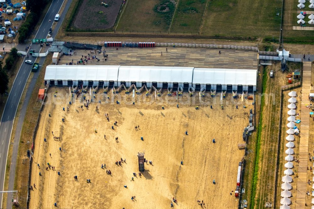 Weeze from above - Participants in the PAROOKAVILLE - Electronic Music Festival music festival on the event concert area in Weeze in the state North Rhine-Westphalia, Germany