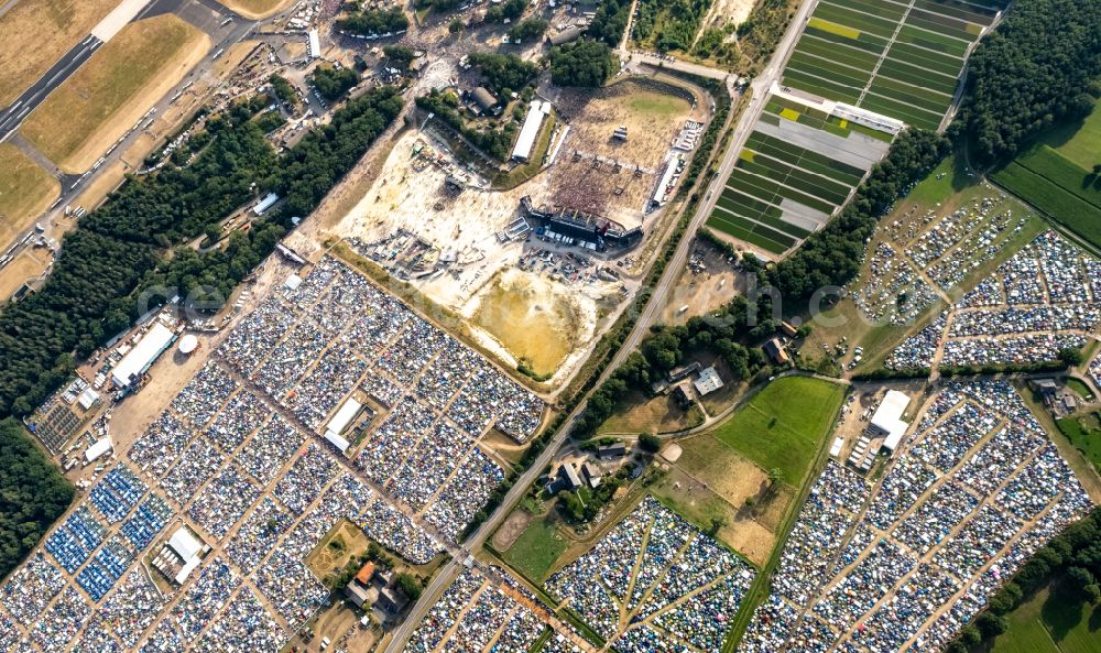 Weeze from above - Participants in the PAROOKAVILLE - Electronic Music Festival music festival on the event concert area in Weeze in the state North Rhine-Westphalia, Germany