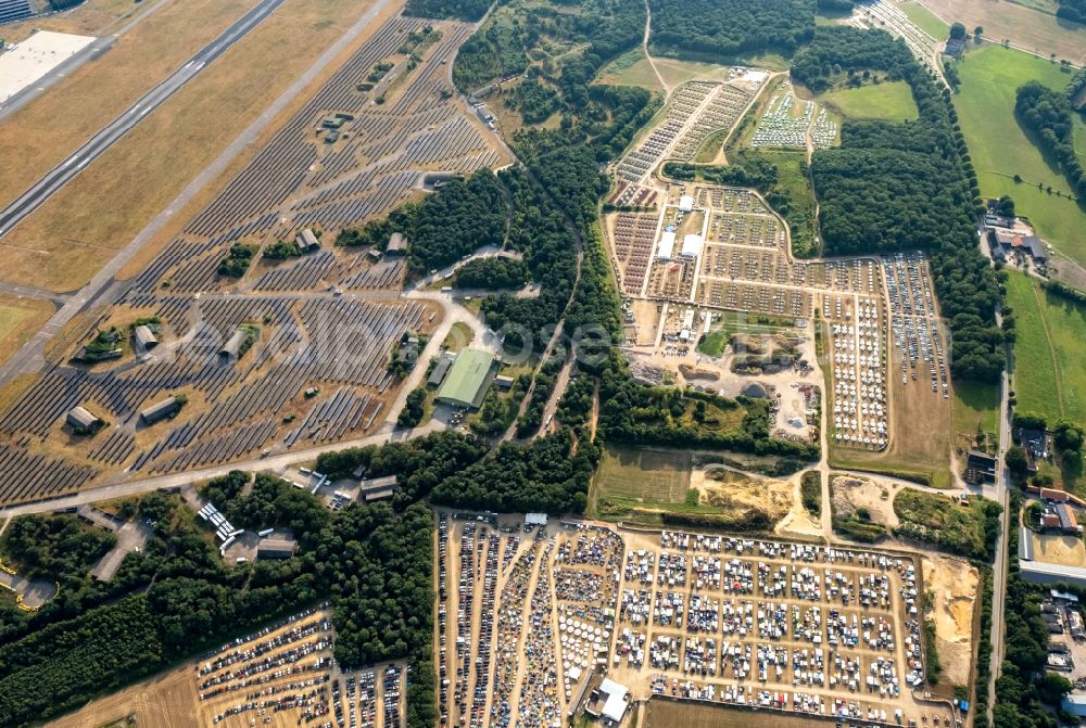 Weeze from above - Participants in the PAROOKAVILLE - Electronic Music Festival music festival on the event concert area in Weeze in the state North Rhine-Westphalia, Germany