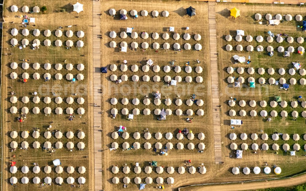 Aerial image Weeze - Participants in the PAROOKAVILLE - Electronic Music Festival music festival on the event concert area in Weeze in the state North Rhine-Westphalia, Germany