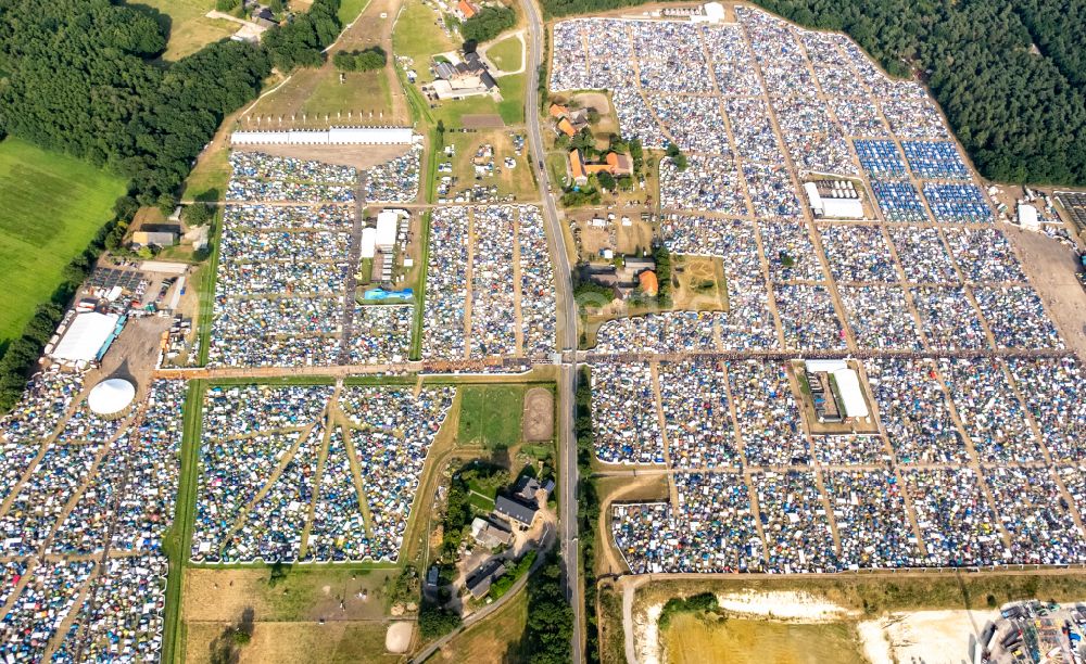 Weeze from above - Participants in the PAROOKAVILLE - Electronic Music Festival music festival on the event concert area in Weeze in the state North Rhine-Westphalia, Germany