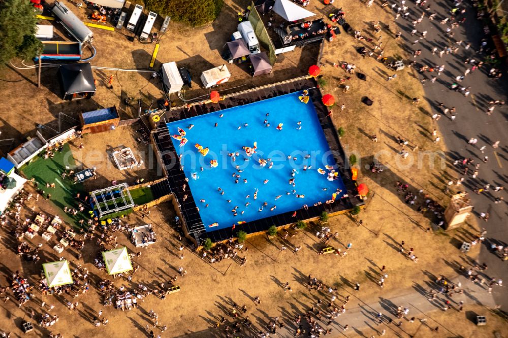 Aerial photograph Weeze - Participants in the PAROOKAVILLE - Electronic Music Festival music festival on the event concert area in Weeze in the state North Rhine-Westphalia, Germany