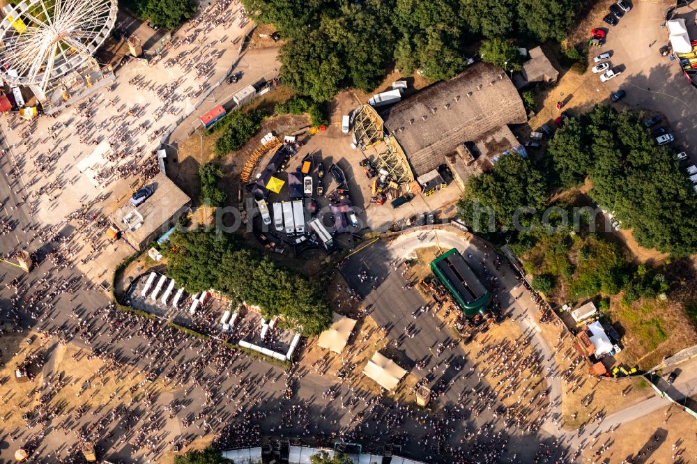 Weeze from above - Participants in the PAROOKAVILLE - Electronic Music Festival music festival on the event concert area in Weeze in the state North Rhine-Westphalia, Germany