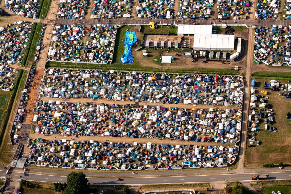 Aerial image Weeze - Participants in the PAROOKAVILLE - Electronic Music Festival music festival on the event concert area in Weeze in the state North Rhine-Westphalia, Germany