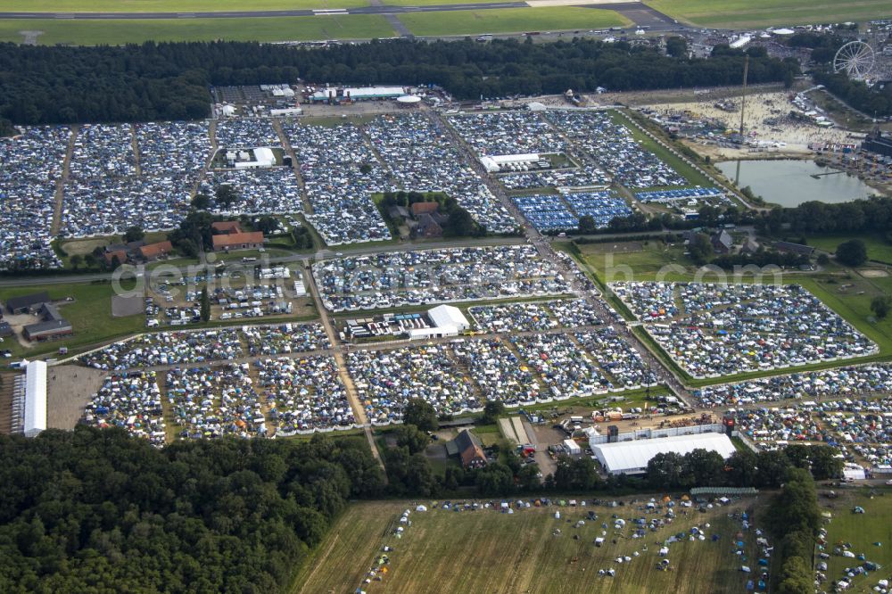 Aerial image Weeze - Participants in the PAROOKAVILLE - Electronic Music Festival music festival on the event concert area in Weeze in the state North Rhine-Westphalia, Germany