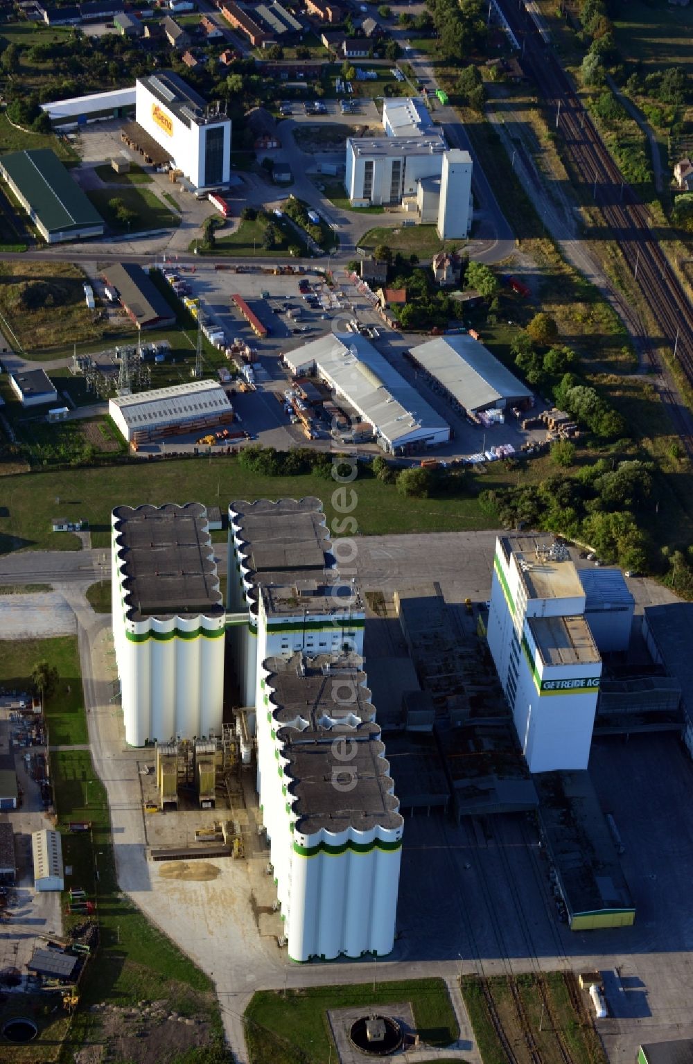 Karstädt from the bird's eye view: View of the grounds of Avena Cereals GmbH and Getreide AG at an industrial area at Muehlenstrasse in the municipality Karstaedt in the Prignitz county of the state Brandenburg