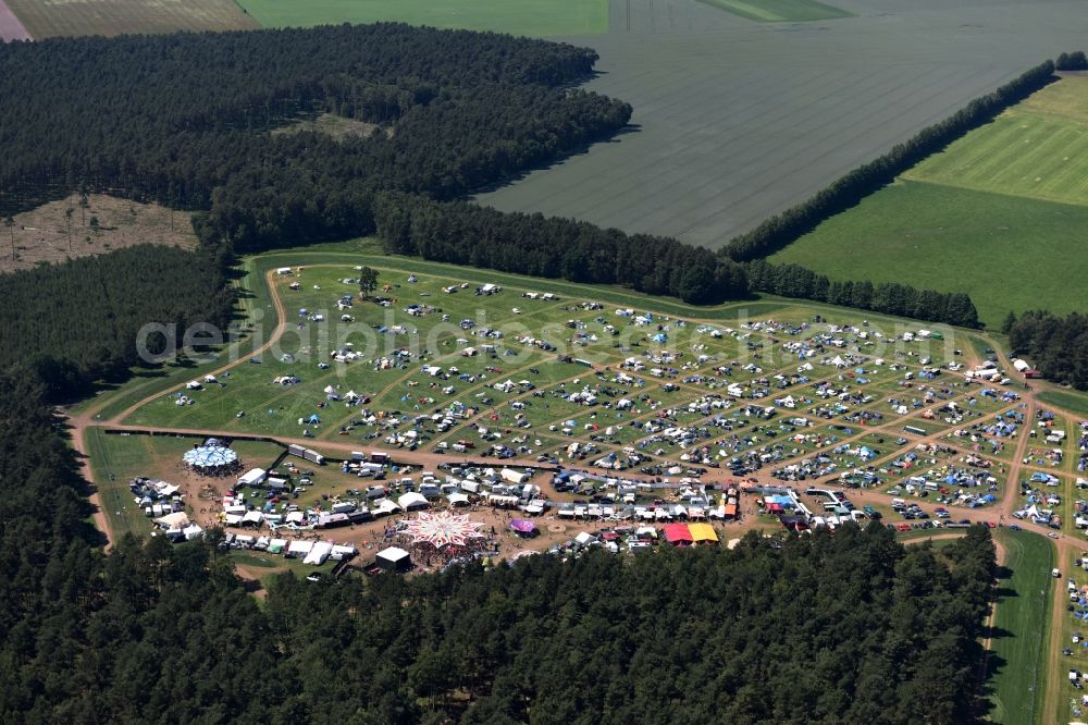 Eldena from the bird's eye view: Participants in the Psychedelic Circus Festival - music festival on the event concert area in Eldena in the state Mecklenburg - Western Pomerania